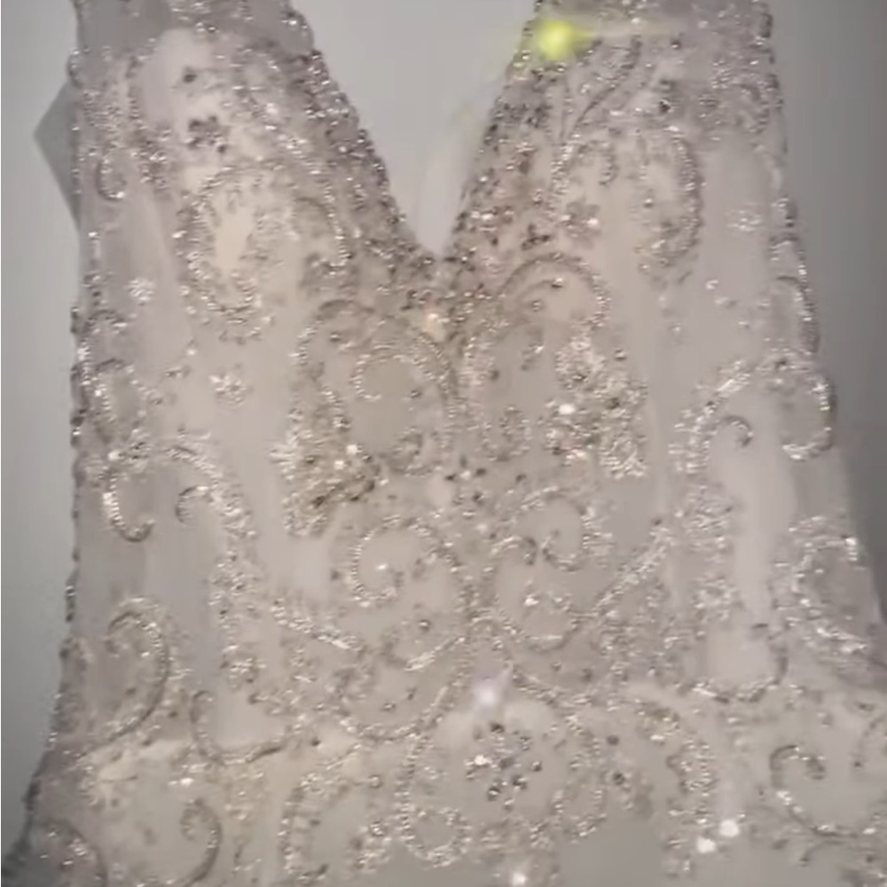 Never worn/ want something else. Still have receipt and tags
